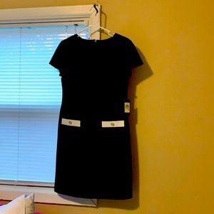 Dress is black/ivory scuba style dress.